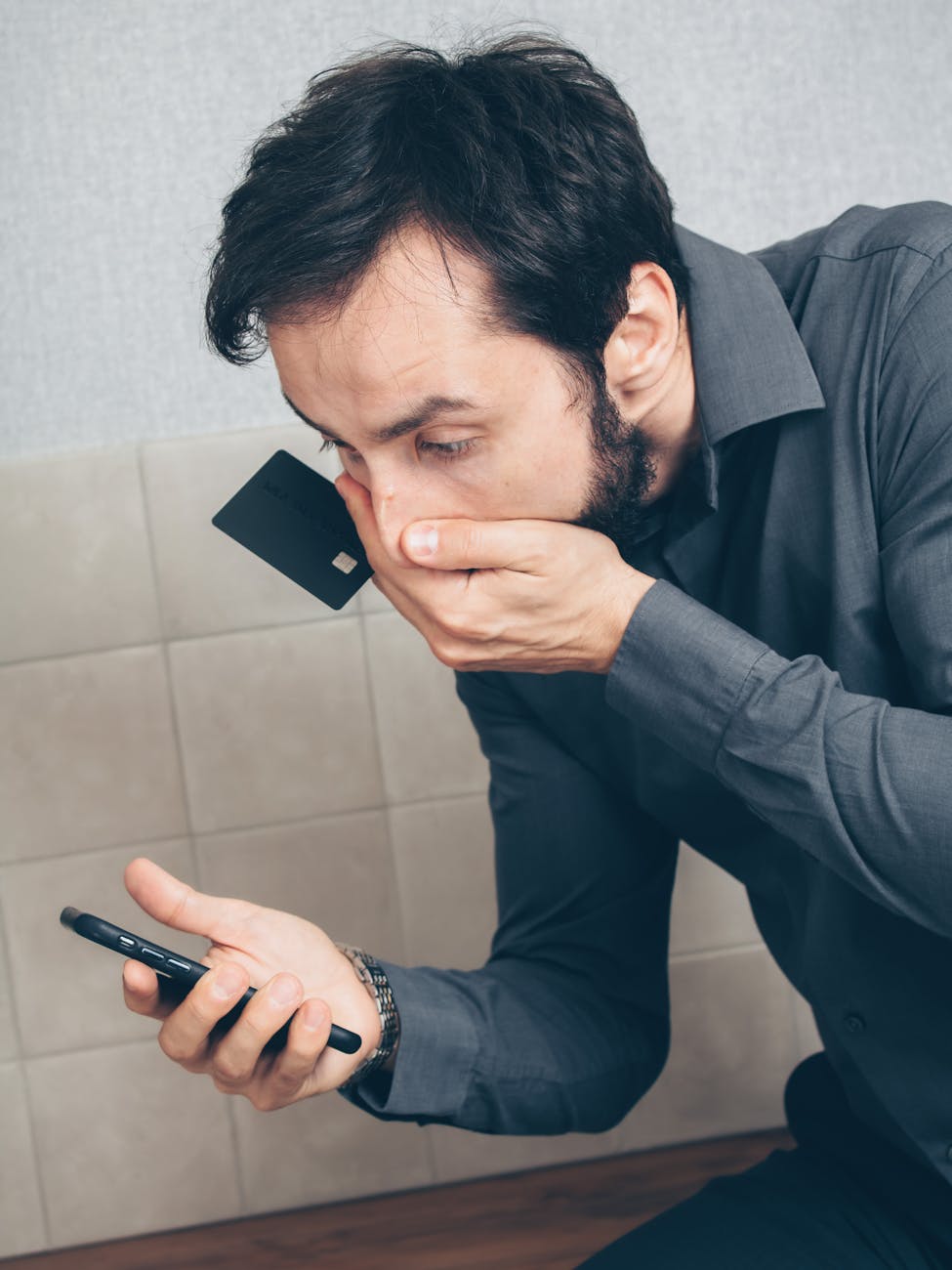 man person with a smartphone discovering a scam